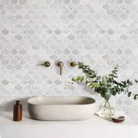 Scallop tiles marble tiles as kitchen splashback